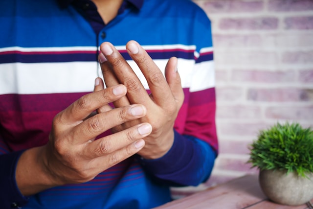 man with painful hand