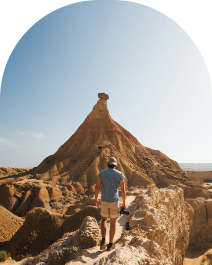 Man hiking in Badlands National Park.